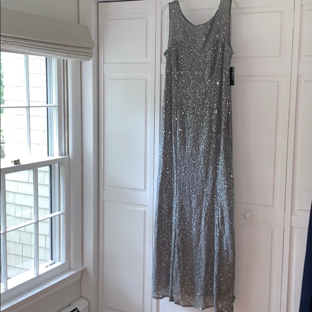 New with tags Silver Sequence Evening Gown size 16